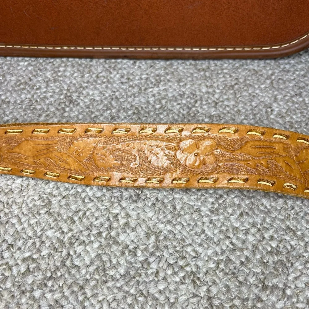 Cowboy belt buckle and leather belt